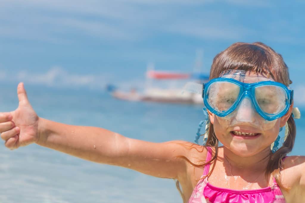 Family trips to Cuba - Happy child in a Cuban beach