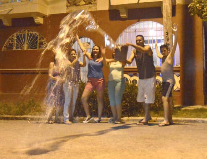 Cuba New Year's Tradition - Throwing Bucket of Water