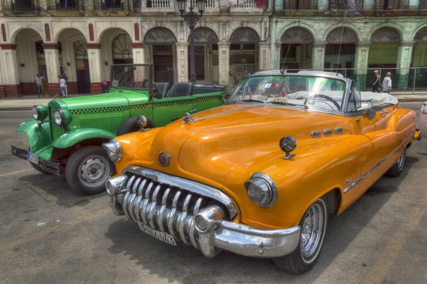 Classic American cars in the street in Havana 7